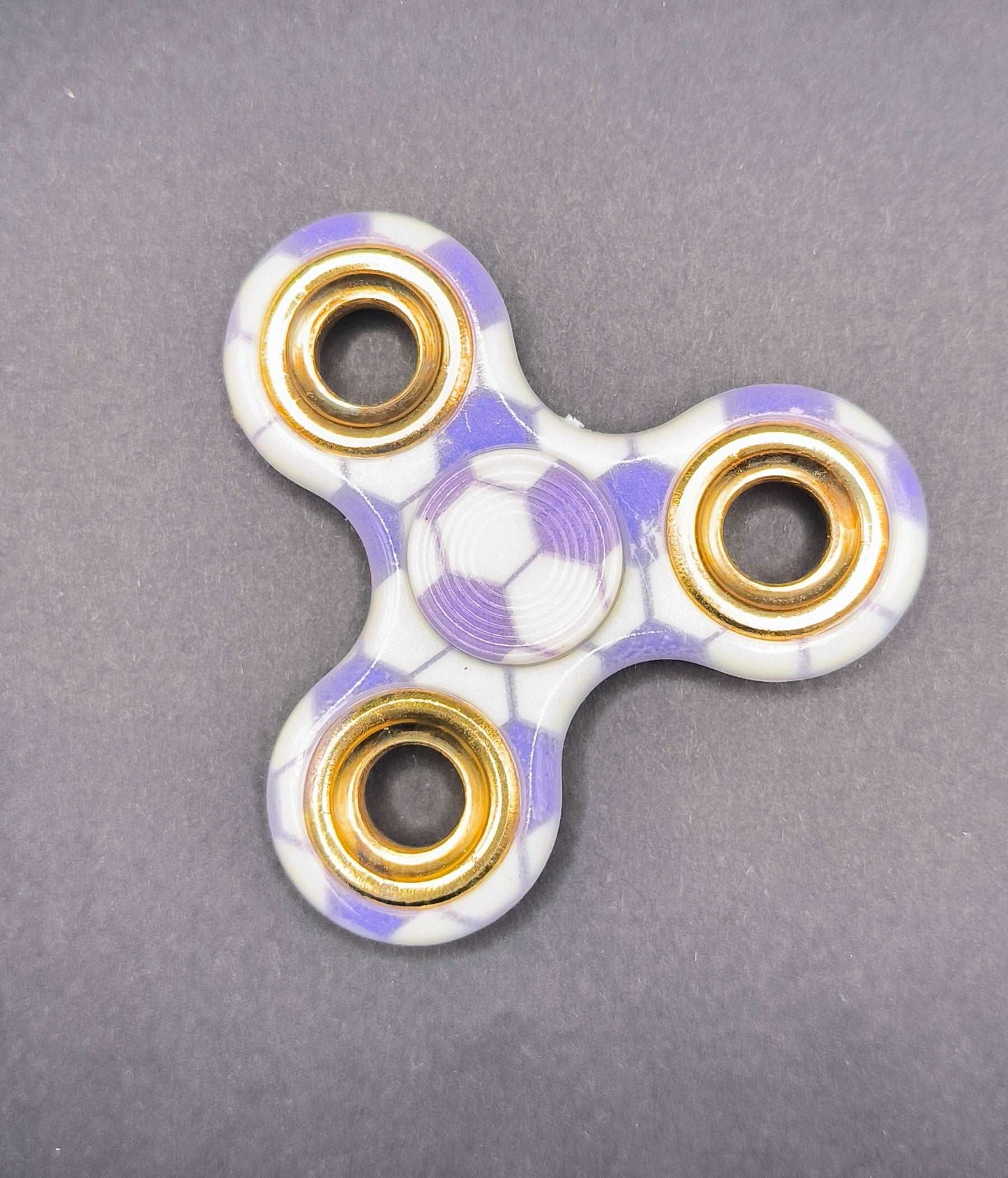 Fidget Sinner mit Kugellager  fußball lila