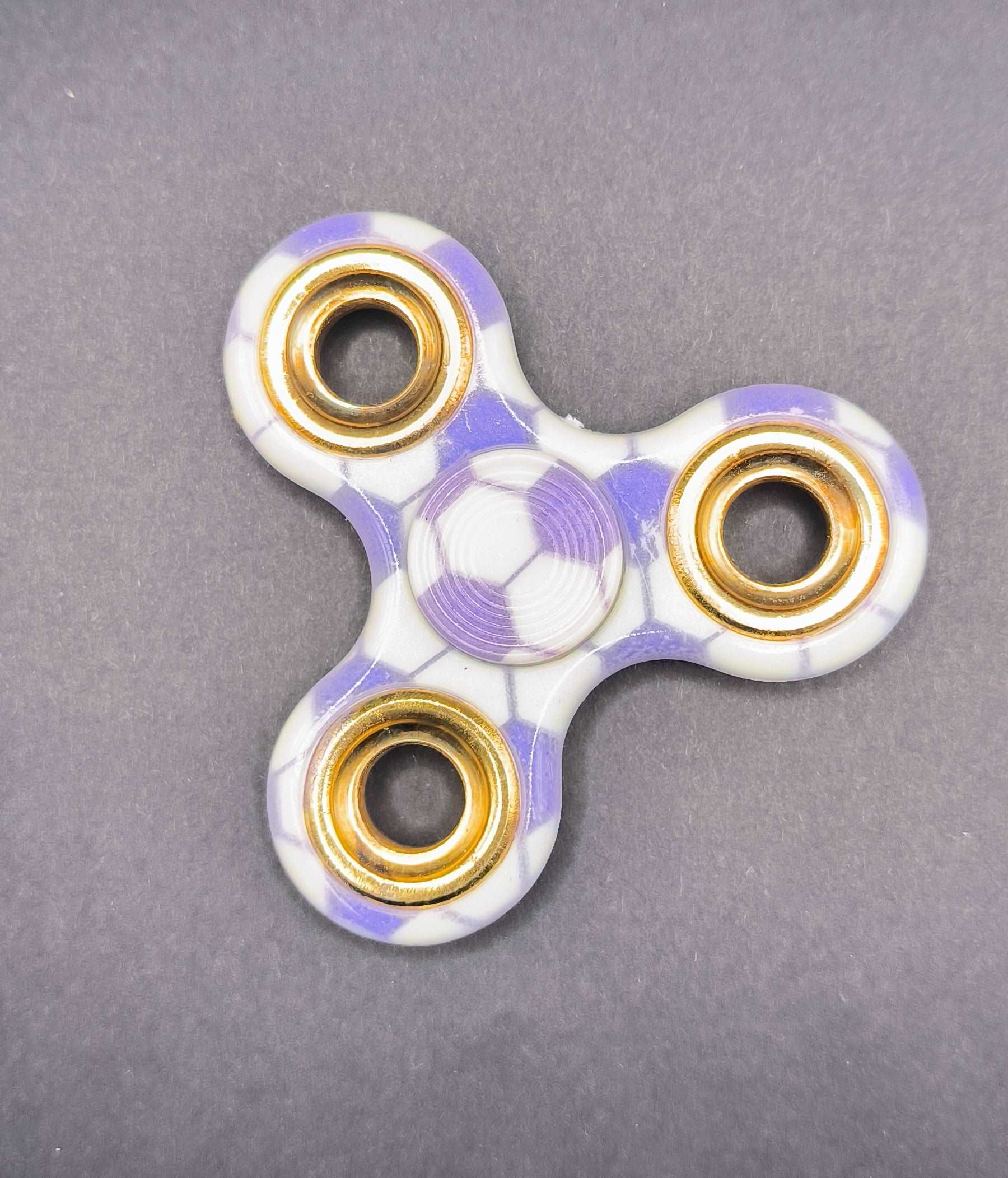 Fidget Sinner mit Kugellager  fußball lila