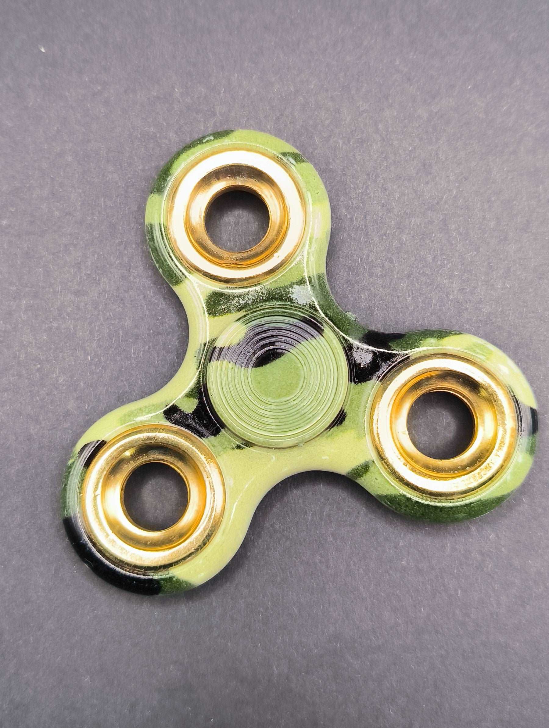 Fidget Sinner mit Kugellager  camoutflage Grün